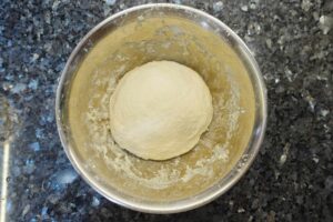 chinese dumpling recipe - knead the dough for 10 minutes until it turns into a smooth ball