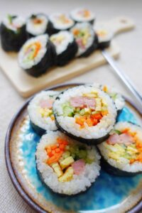 Korean rice roll kim bap recipe image of serving kim bap