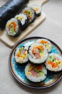 Korean rice roll kim bap recipe showing how to serve kim bap